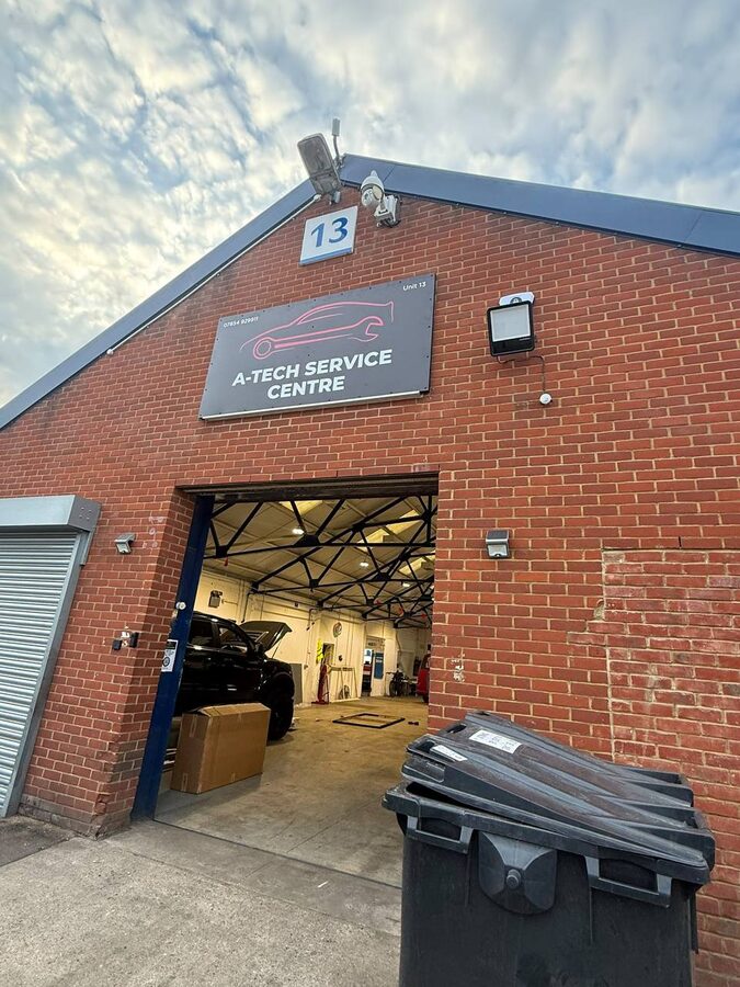 Unit 13 entrance of A-Tech Service Centre with the workshop doors open
